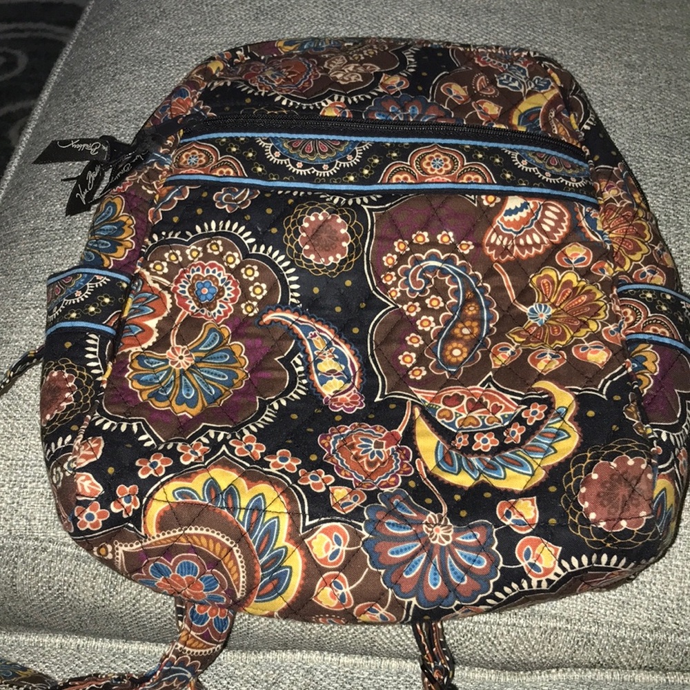 A purse size backpack in browner tones